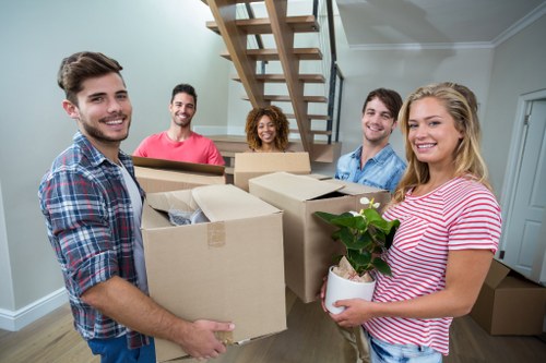 Student removals team helping with boxes and furniture in Plumstead