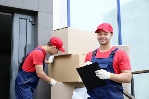 Urgent same day removals team loading furniture in Plumstead