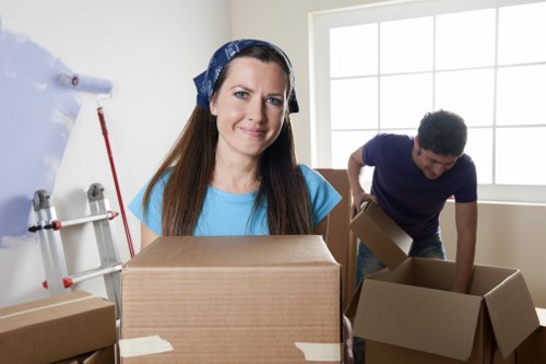 House removalists in Plumstead preparing a home move with packing boxes