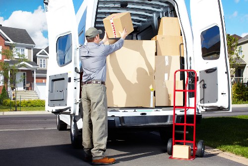 Removal team handling furniture during a Plumstead house move