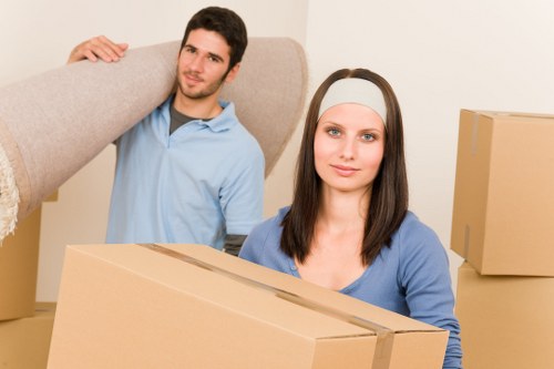 Packed boxes and furniture prepared for truck hire moving day