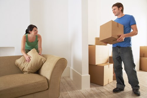 House removal service in Plumstead with packed boxes and moving equipment