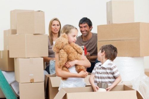 Careful loading of household furniture into a moving van